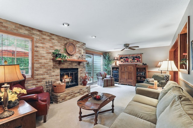 2657 Valley View Ln, New Brighton, MN 55112 - living room with carpet, a brick fireplace, and ceiling fan