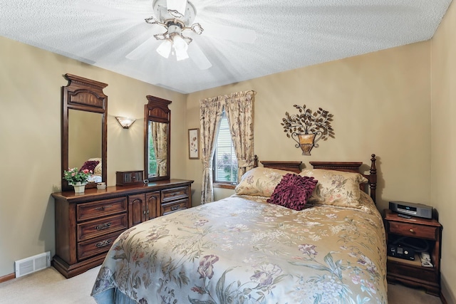 2657 Valley View Ln, New Brighton, MN 55112 - bedroom with light colored carpet, a textured ceiling, and a ceiling fan