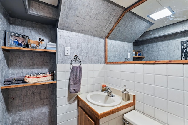 2657 Valley View Ln, New Brighton, MN 55112 - half bathroom with vanity and tile walls