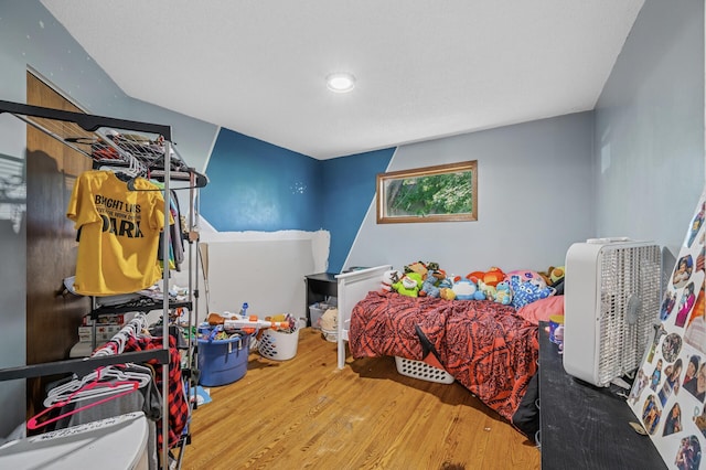 132 Middle School Dr, Saint Croix Falls, WI 54024 - bedroom featuring wood finished floors and recessed lighting