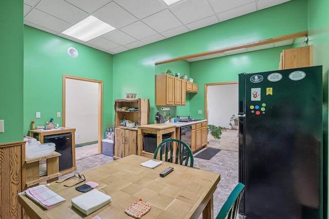 132 Middle School Dr, Saint Croix Falls, WI 54024 - dining area with light colored carpet and a paneled ceiling