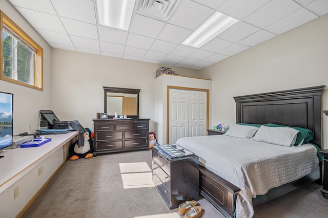 132 Middle School Dr, Saint Croix Falls, WI 54024 - carpeted bedroom featuring a drop ceiling, a desk, and a closet