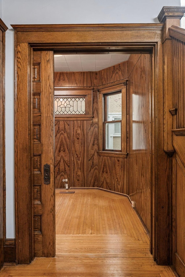 3225 Hennepin Ave, Minneapolis, MN 55408 - entryway featuring wood walls and light wood finished floors