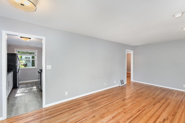 3101 Texas Ave S, Saint Louis Park, MN 55426 - empty room featuring light wood-style flooring and baseboards