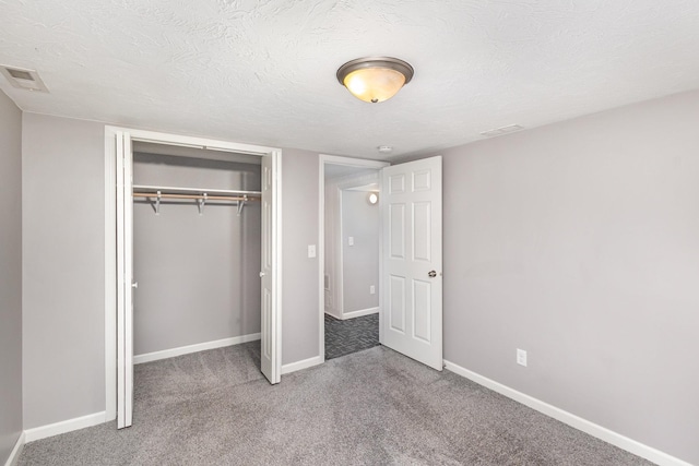 3101 Texas Ave S, Saint Louis Park, MN 55426 - unfurnished bedroom with carpet flooring, a closet, and a textured ceiling