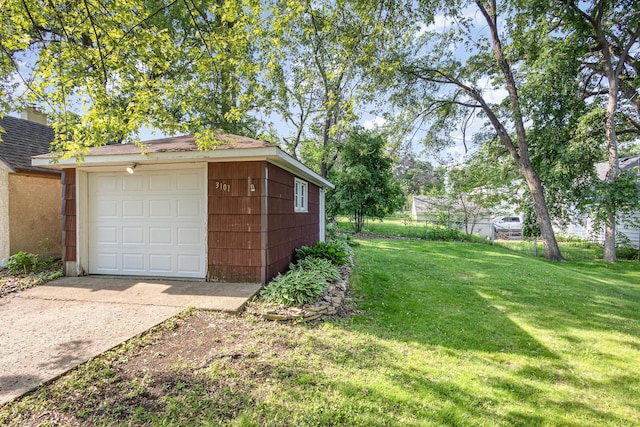 3101 Texas Ave S, Saint Louis Park, MN 55426 - detached garage featuring driveway