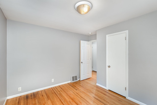 3101 Texas Ave S, Saint Louis Park, MN 55426 - unfurnished bedroom with baseboards and light wood-style flooring