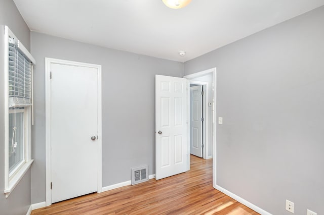 3101 Texas Ave S, Saint Louis Park, MN 55426 - unfurnished bedroom with light wood finished floors and baseboards