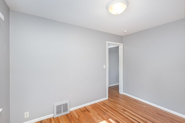 3101 Texas Ave S, Saint Louis Park, MN 55426 - empty room with light wood-style floors and a smoke detector