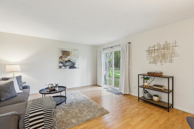 902 Ridge Dr SE, Saint Michael, MN 55376 - living room featuring wood finished floors and baseboards
