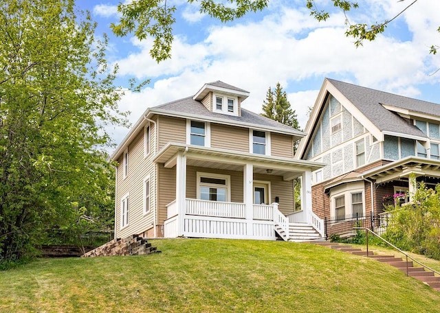 1901 5th St, Duluth, MN 55812 - traditional style home with a porch and a front lawn