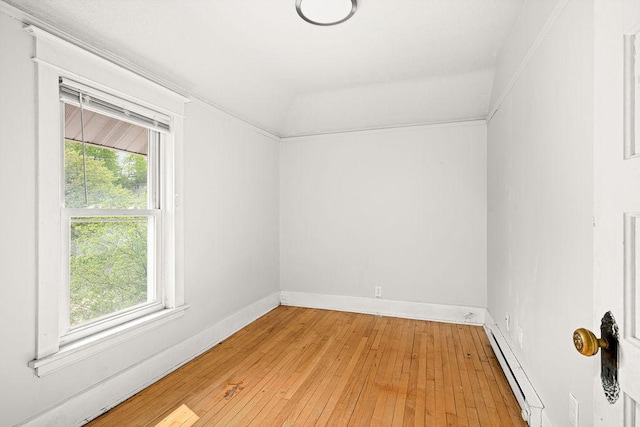 1901 5th St, Duluth, MN 55812 - spare room with a baseboard heating unit, healthy amount of natural light, light wood-type flooring, and baseboards
