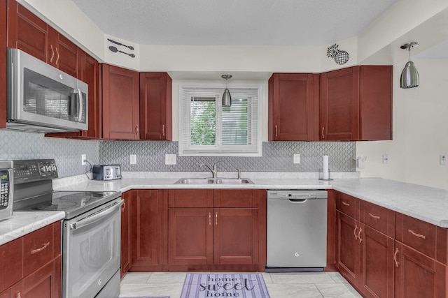 495 Saint Anthony Ave, Saint Paul, MN 55103 - kitchen with appliances with stainless steel finishes, dark brown cabinets, light marble finish flooring, and light countertops