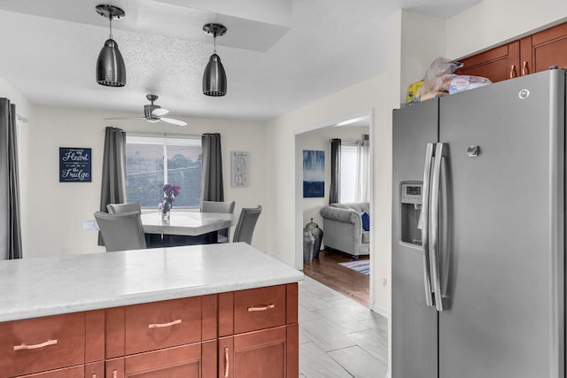 495 Saint Anthony Ave, Saint Paul, MN 55103 - kitchen featuring stainless steel fridge with ice dispenser, pendant lighting, and a ceiling fan