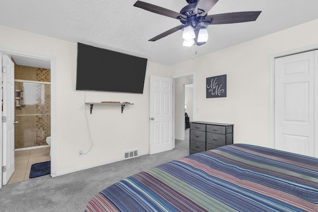 495 Saint Anthony Ave, Saint Paul, MN 55103 - bedroom with carpet floors, ensuite bath, and ceiling fan