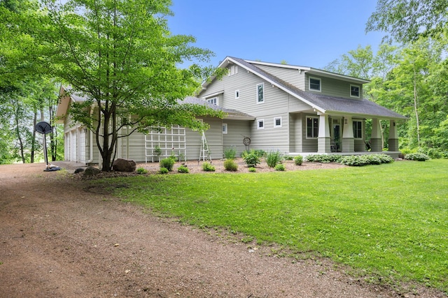 10390 Fenner Ave SE, Franklin Twp, MN 55328 - view of front of home with covered porch, a front yard, and a shingled roof