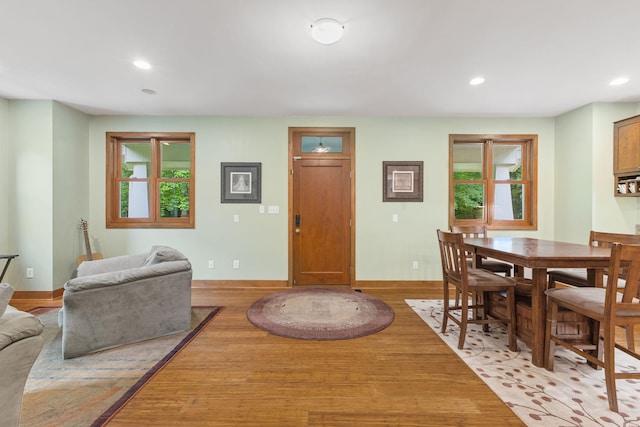 10390 Fenner Ave SE, Franklin Twp, MN 55328 - dining room featuring healthy amount of natural light, light wood-type flooring, recessed lighting, and baseboards