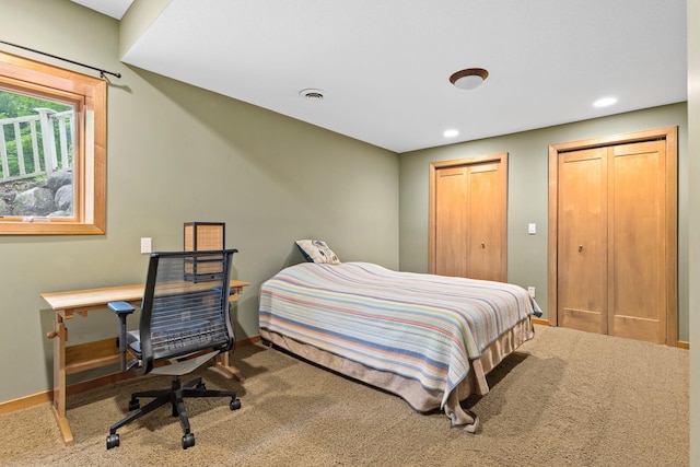 10390 Fenner Ave SE, Franklin Twp, MN 55328 - bedroom featuring carpet, baseboards, two closets, and recessed lighting