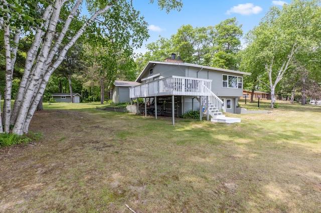 8996 Little Pelican Dr, Pelican Twp, MN 56472 - rear view of house with stairs, a deck, a lawn, a chimney, and view of scattered trees