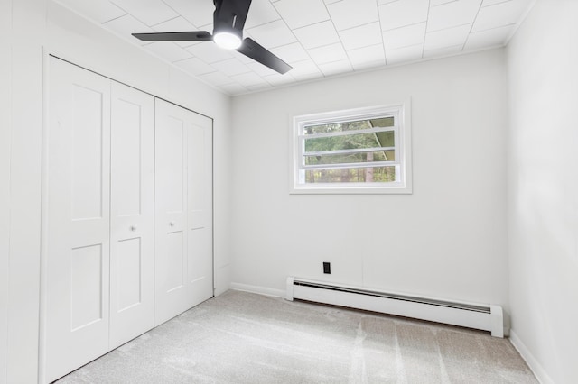 8996 Little Pelican Dr, Pelican Twp, MN 56472 - unfurnished bedroom featuring a baseboard radiator, carpet floors, a closet, and baseboards
