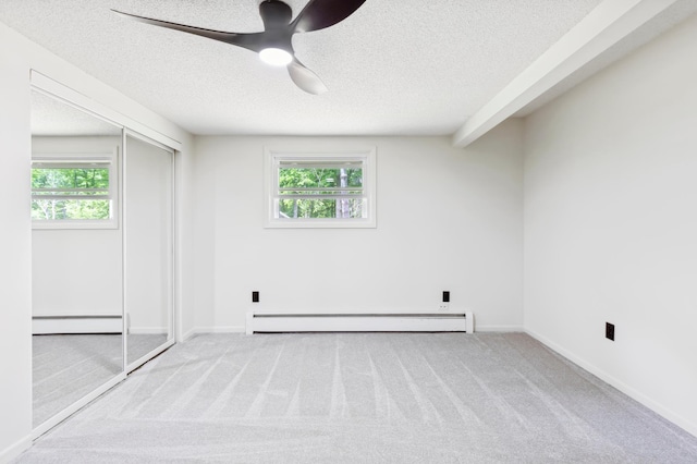 8996 Little Pelican Dr, Pelican Twp, MN 56472 - unfurnished bedroom with a baseboard radiator, a textured ceiling, carpet, and a ceiling fan