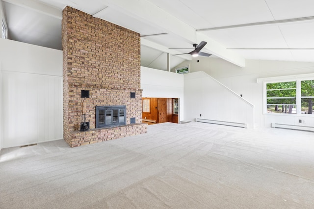 8996 Little Pelican Dr, Pelican Twp, MN 56472 - unfurnished living room with a baseboard heating unit, carpet floors, a ceiling fan, a fireplace, and wood walls