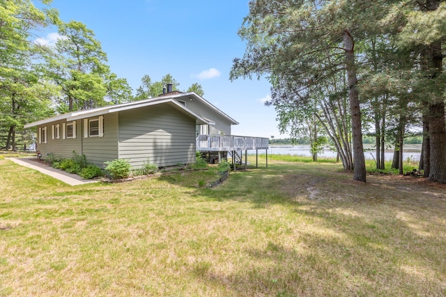 8996 Little Pelican Dr, Pelican Twp, MN 56472 - view of side of property with a yard and a deck with water view