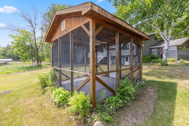 8996 Little Pelican Dr, Pelican Twp, MN 56472 - view of outdoor structure featuring a sunroom
