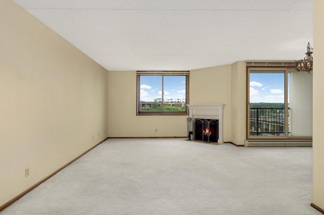 7200 York Ave S Unit 608, Edina, MN 55435 - unfurnished living room with plenty of natural light, a fireplace with flush hearth, a baseboard heating unit, and carpet floors