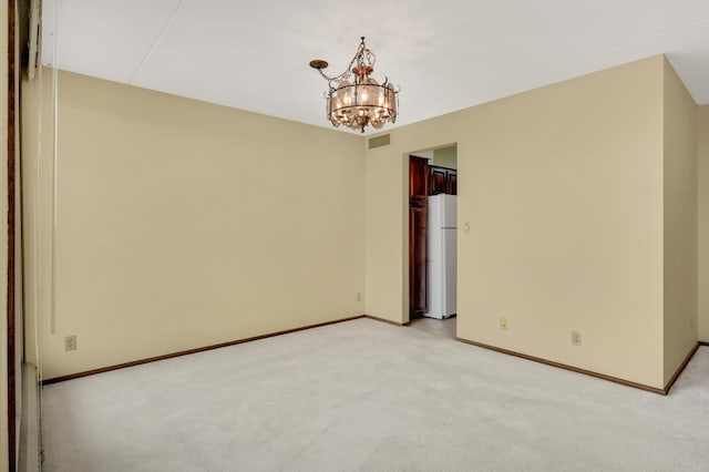 7200 York Ave S Unit 608, Edina, MN 55435 - unfurnished room featuring a chandelier, light carpet, and baseboards