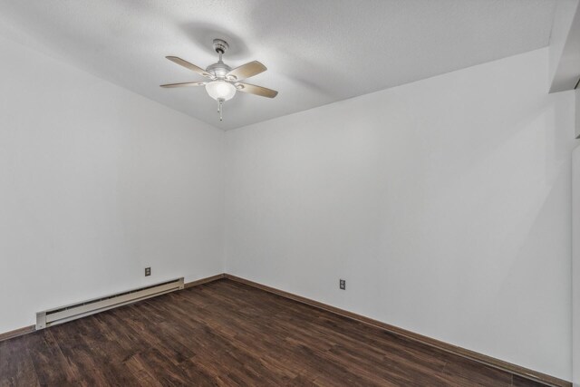 400 Shelard Pkwy Unit 303, Saint Louis Park, MN 55426 - empty room featuring a baseboard radiator, a ceiling fan, dark wood finished floors, and baseboards