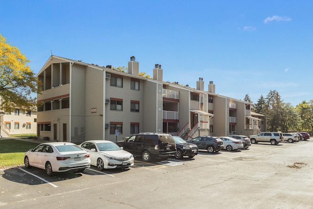 400 Shelard Pkwy Unit 303, Saint Louis Park, MN 55426 - view of building exterior featuring uncovered parking
