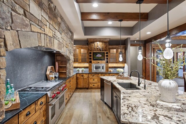 9328 Rhoy Ave, Chaska, MN 55318 - kitchen featuring stainless steel appliances, a sink, light wood finished floors, open shelves, and tasteful backsplash