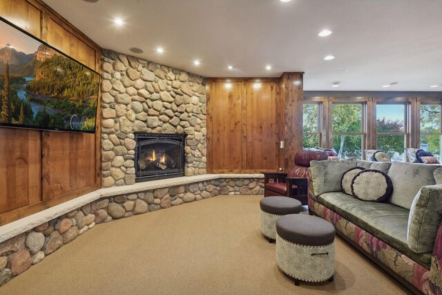 9328 Rhoy Ave, Chaska, MN 55318 - living room featuring recessed lighting, a stone fireplace, and carpet flooring