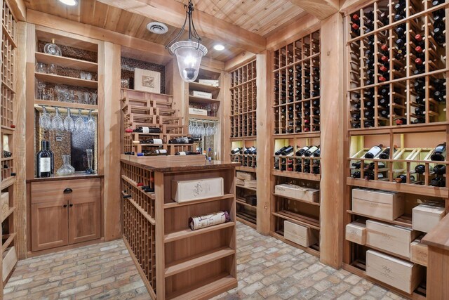 9328 Rhoy Ave, Chaska, MN 55318 - wine cellar featuring brick floors and wooden ceiling
