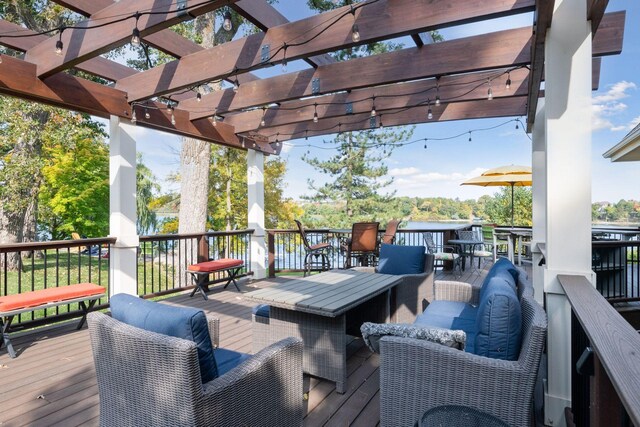9328 Rhoy Ave, Chaska, MN 55318 - deck featuring a pergola and outdoor lounge area