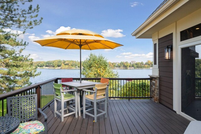 9328 Rhoy Ave, Chaska, MN 55318 - deck featuring a water view and outdoor dining area