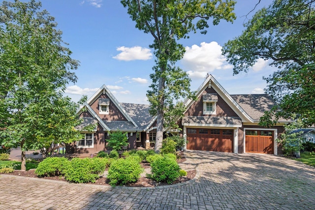 9328 Rhoy Ave, Chaska, MN 55318 - view of front of home with decorative driveway and an attached garage