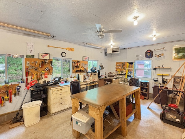 256 22 5/8 Ave, Crystal Lake Twp, WI 54829 - dining area featuring ceiling fan, a workshop area, and a textured ceiling