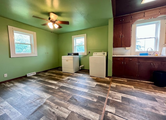 406 1st St S, Hoffman, MN 56339 - washroom with separate washer and dryer, cabinet space, ceiling fan, and healthy amount of natural light