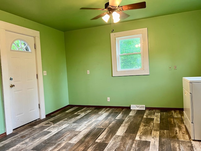 406 1st St S, Hoffman, MN 56339 - entryway with dark wood-type flooring, ceiling fan, washer / clothes dryer, and baseboards
