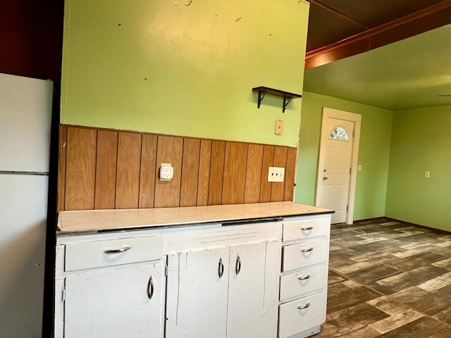 406 1st St S, Hoffman, MN 56339 - kitchen featuring freestanding refrigerator, white cabinets, and light countertops