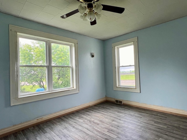 406 1st St S, Hoffman, MN 56339 - spare room with wood finished floors, baseboards, and a ceiling fan