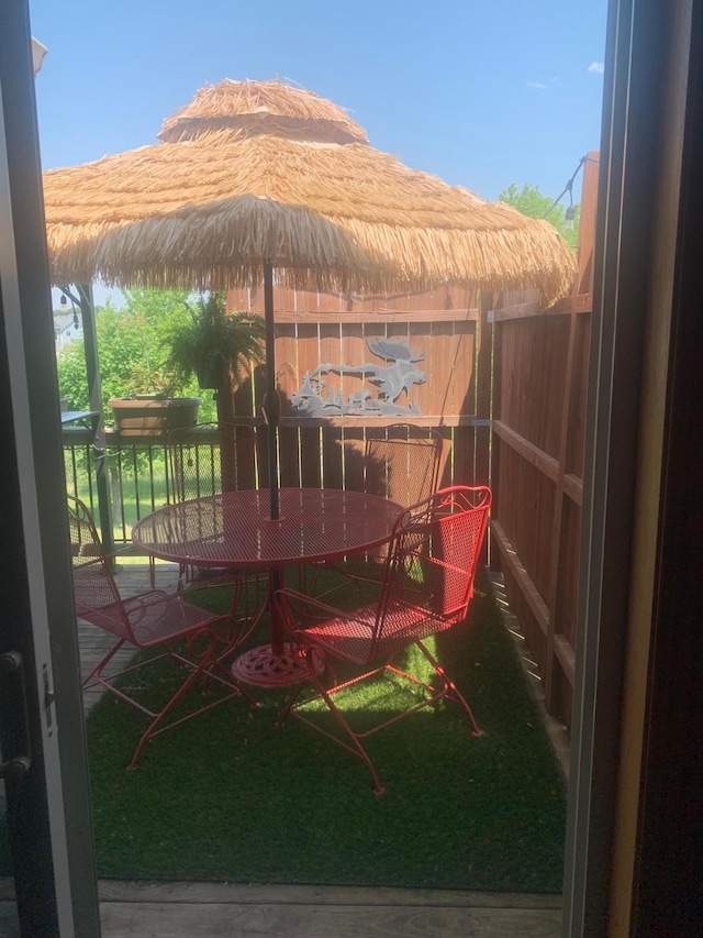 922 Whiskey Rd NW, Isanti, MN 55040 - view of patio featuring outdoor dining space