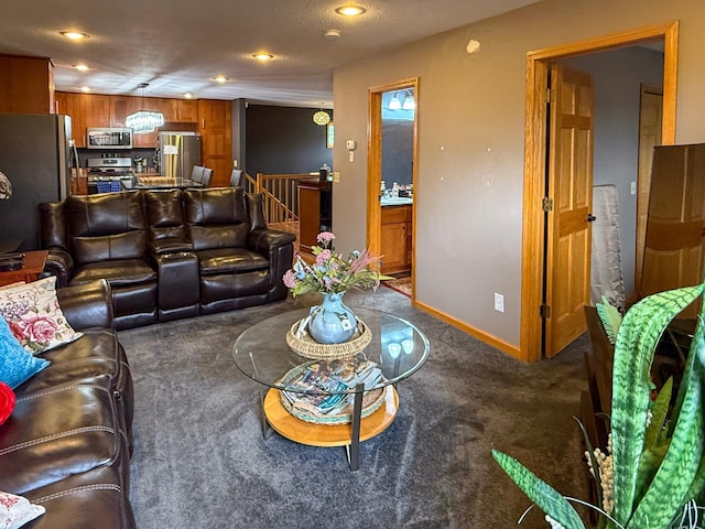 922 Whiskey Rd NW, Isanti, MN 55040 - living area featuring carpet floors, recessed lighting, and baseboards