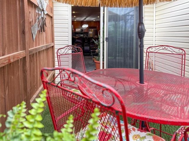 922 Whiskey Rd NW, Isanti, MN 55040 - view of patio featuring outdoor dining space
