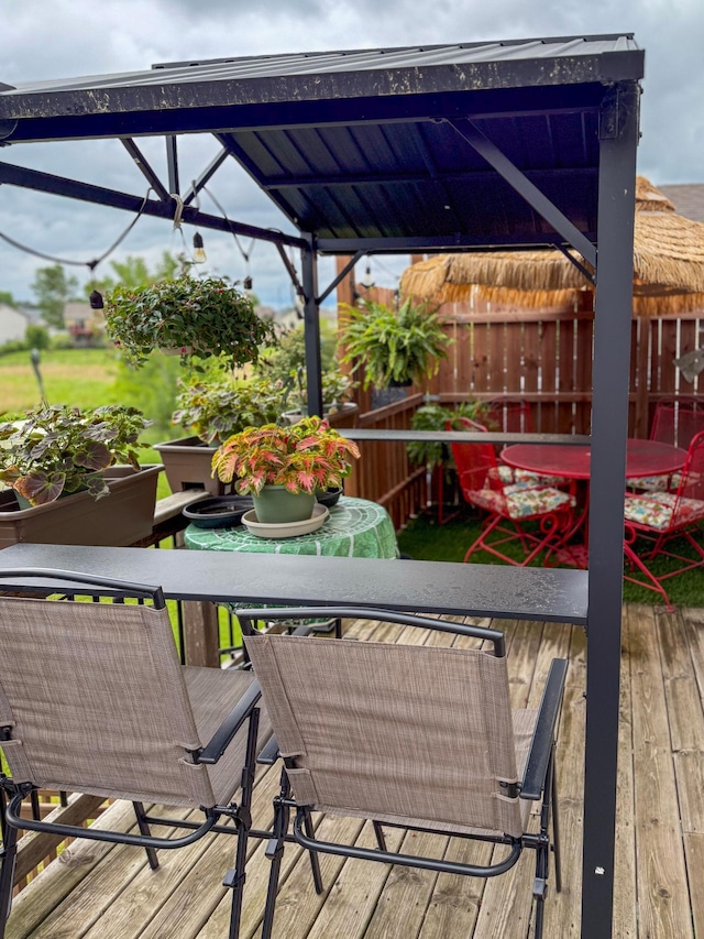 922 Whiskey Rd NW, Isanti, MN 55040 - deck with outdoor dining area