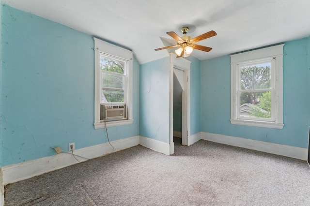 363 Geranium Ave E, Saint Paul, MN 55130 - unfurnished bedroom featuring carpet floors, multiple windows, baseboards, lofted ceiling, and a ceiling fan