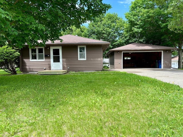1116 Whitford St, Fergus Falls, MN 56537 - view of front facade featuring a garage, an outbuilding, and a front yard