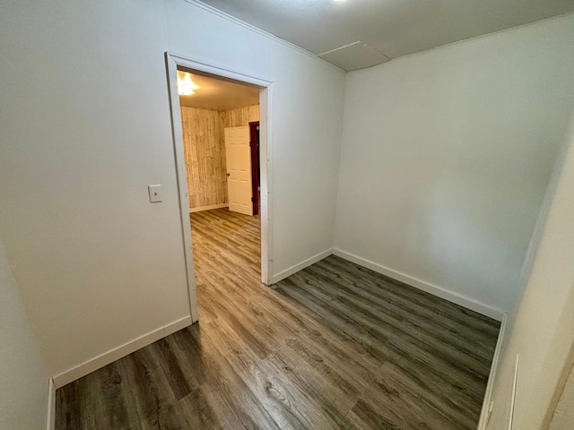1116 Whitford St, Fergus Falls, MN 56537 - empty room featuring wood finished floors and wood walls